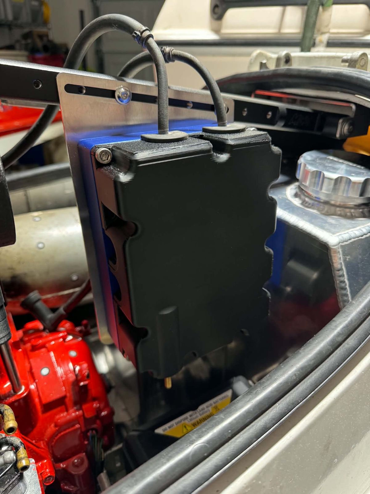 Printed ECU cover with cable grommets, installed