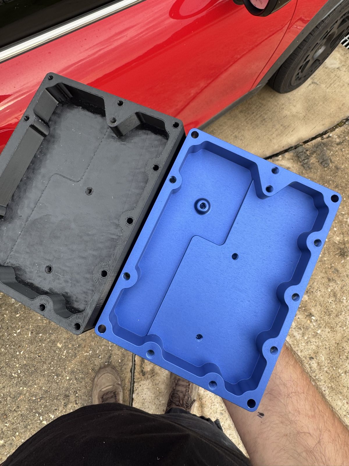 Printed prototype next to the final machined part